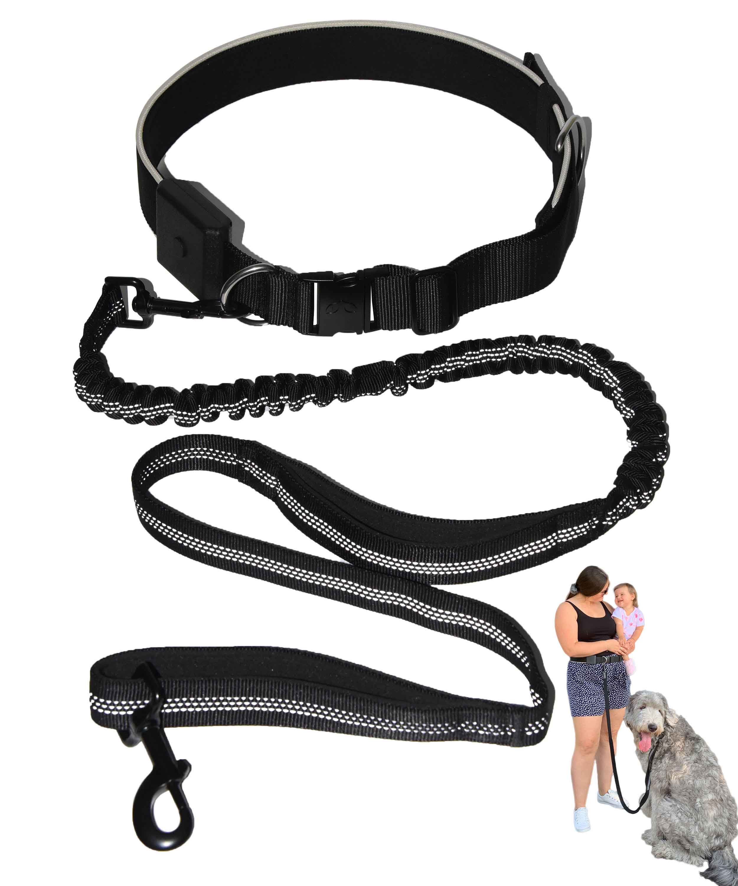 Black hands-free dog leash with bungee shown by mother walking large dog while holding child for safe hands-free walks.